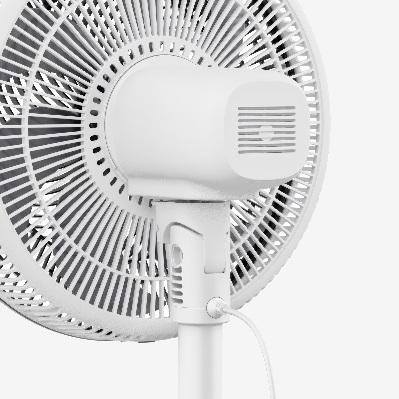 White oscillating wall fan on a white background