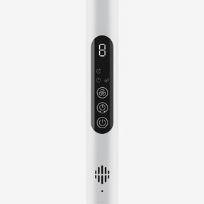 A close-up of a white cylindrical device with a black vertical control panel featuring a digital display and four circular buttons, set against a light gray background.
