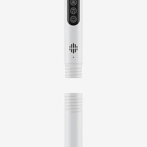 A white electronic device with a black control panel showing three icons, displayed in a split view with the top section above a matching white cylindrical base on a light gray background.