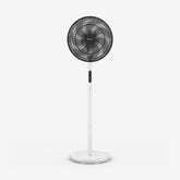 Black and white standing fan on a white background